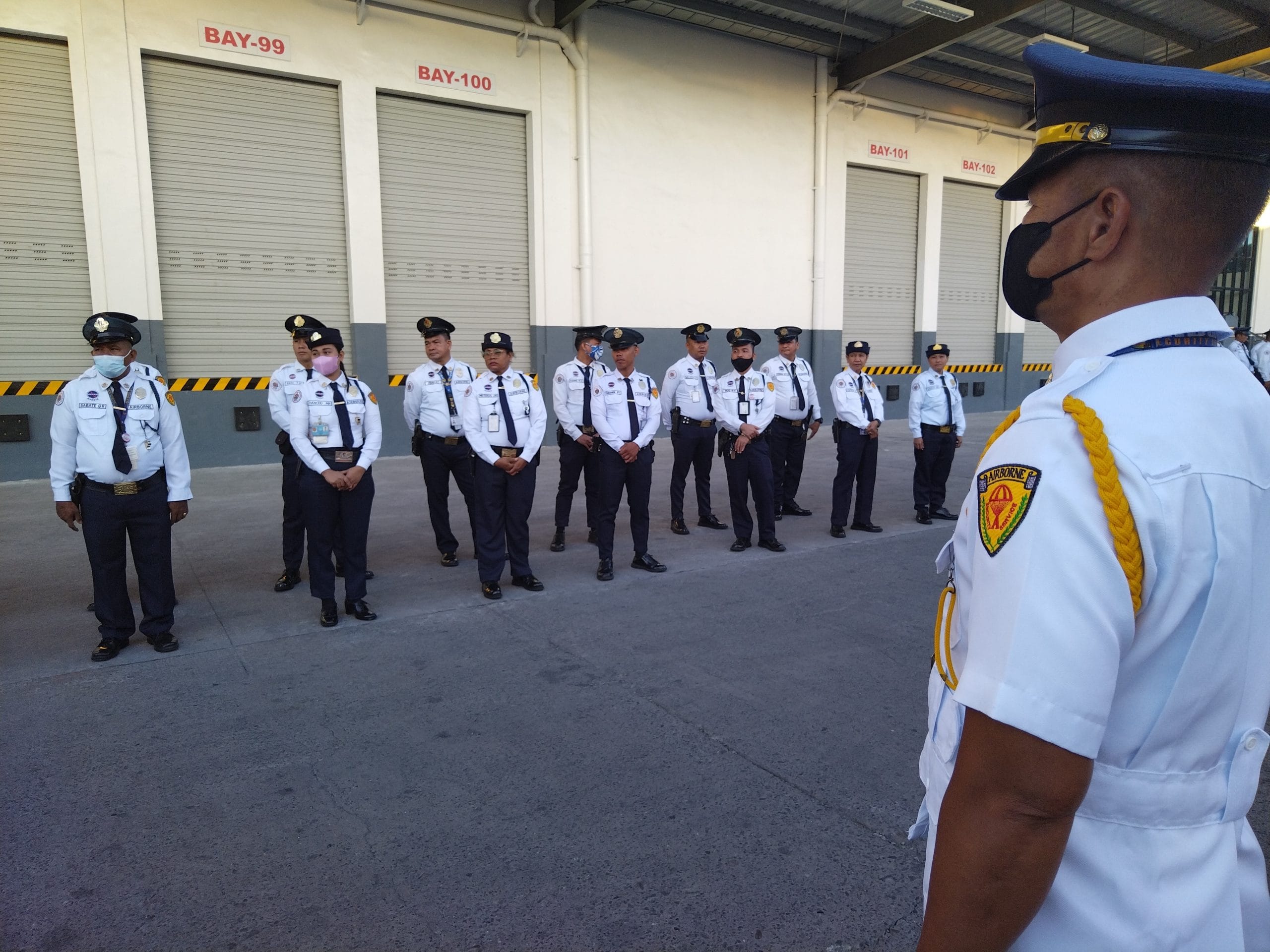 An Airborne supervisor inspecting officers in formation
