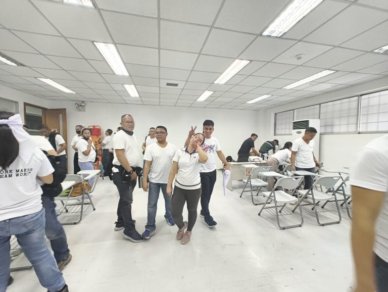 Airborne personnel gathered after a training seminar